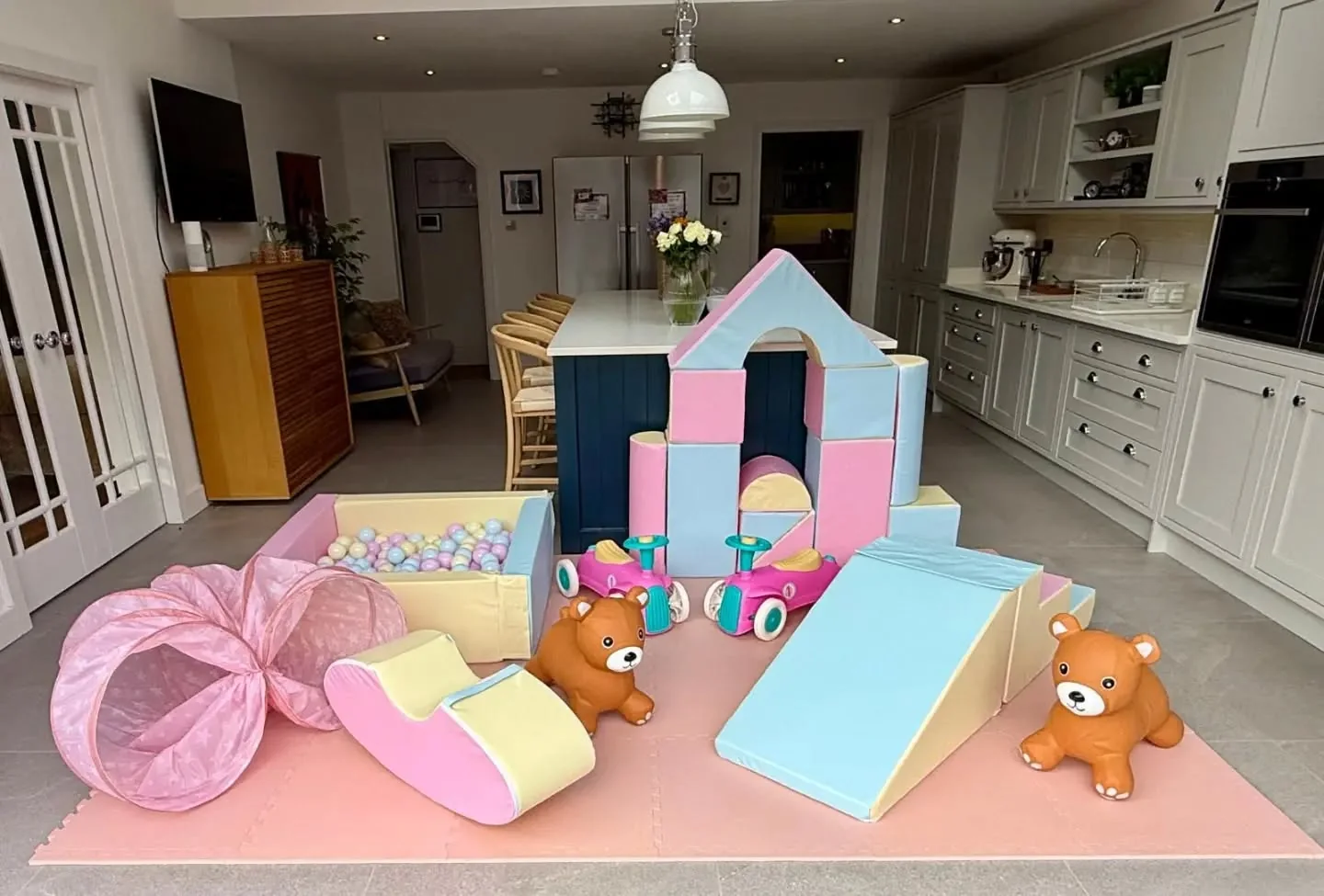 Pastel Play Parcel setup in pink, baby blue and cream